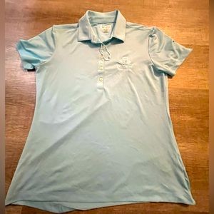 NWOT GREG NORMAN Women’s size med  golf shirt.